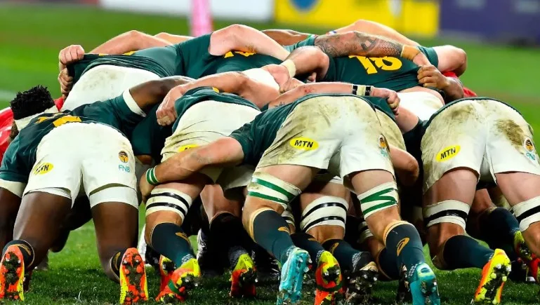 Rugby team in scrum formation